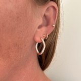 Dual Tone Inside-Out Pavé Diamond Squiggle Hoop Earrings in 14K Gold by Elyzian