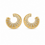 A pair of gold crescent-shaped stud earrings decorated with rows of small clear pavé stones, set against a plain white background.