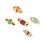 5 elyzian gemstone bezel set trio rings in 18k yellow gold top angle 