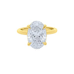Top view of a Lab diamond 4ct oval solitaire engagement ring in 14k yellow gold by Elyzian Fine Jewelry
