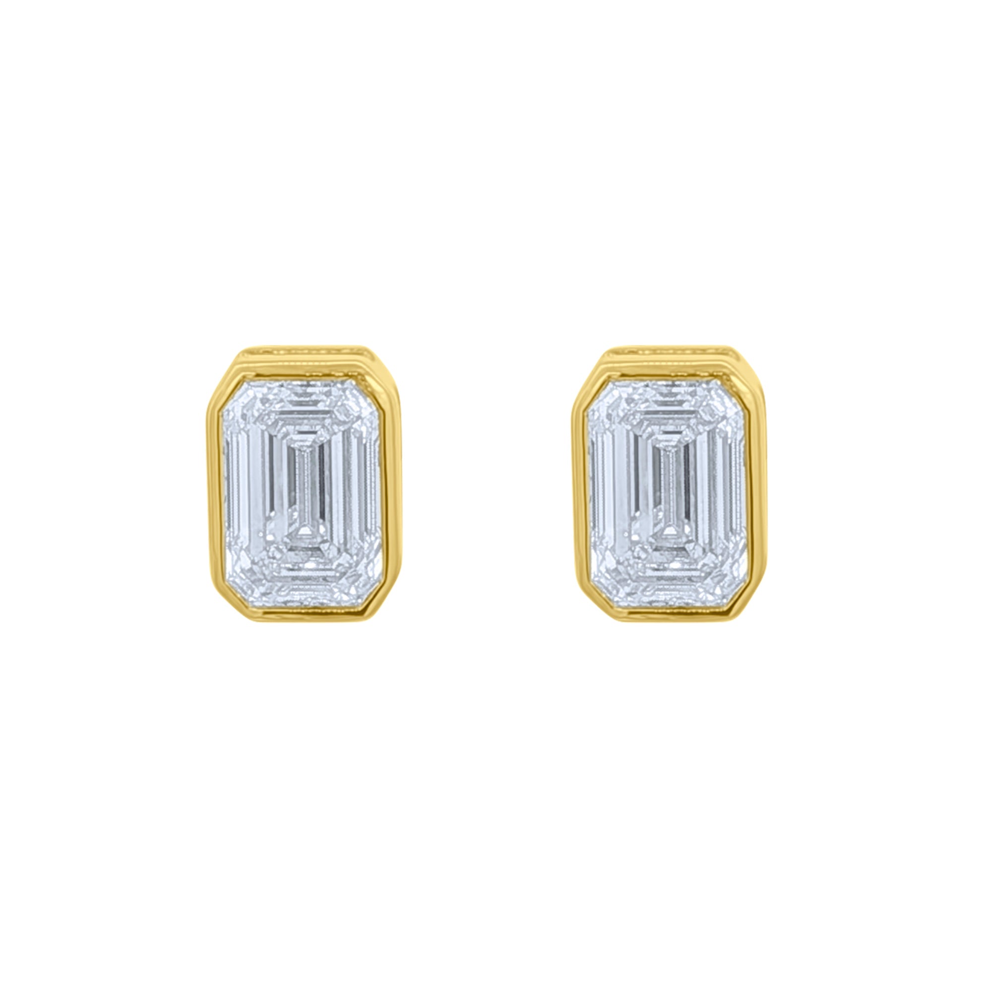 Lab diamond emerald cut bezel set stud earrings in 14k yellow gold by Elyzian Fine Jewelry

