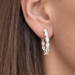 Lab-Grown Oval Diamond Inside-Out Hoops in 14K Yellow Gold by Elyzian on model 