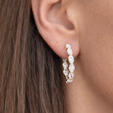 Lab-Grown Oval Diamond Inside-Out Hoops in 14K Yellow Gold by Elyzian on model 