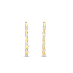 Large Diamond Prong Set Huggie Hoop Earrings in 14K Yellow Gold by Elyzian – front view