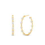 Side view of Large Diamond Prong Set Huggie Hoop Earrings in 14K Yellow Gold by Elyzian