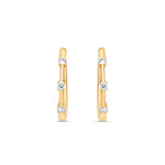 Medium Diamond Prong Set Huggie Hoop Earrings in 14K Yellow Gold by Elyzian – front view