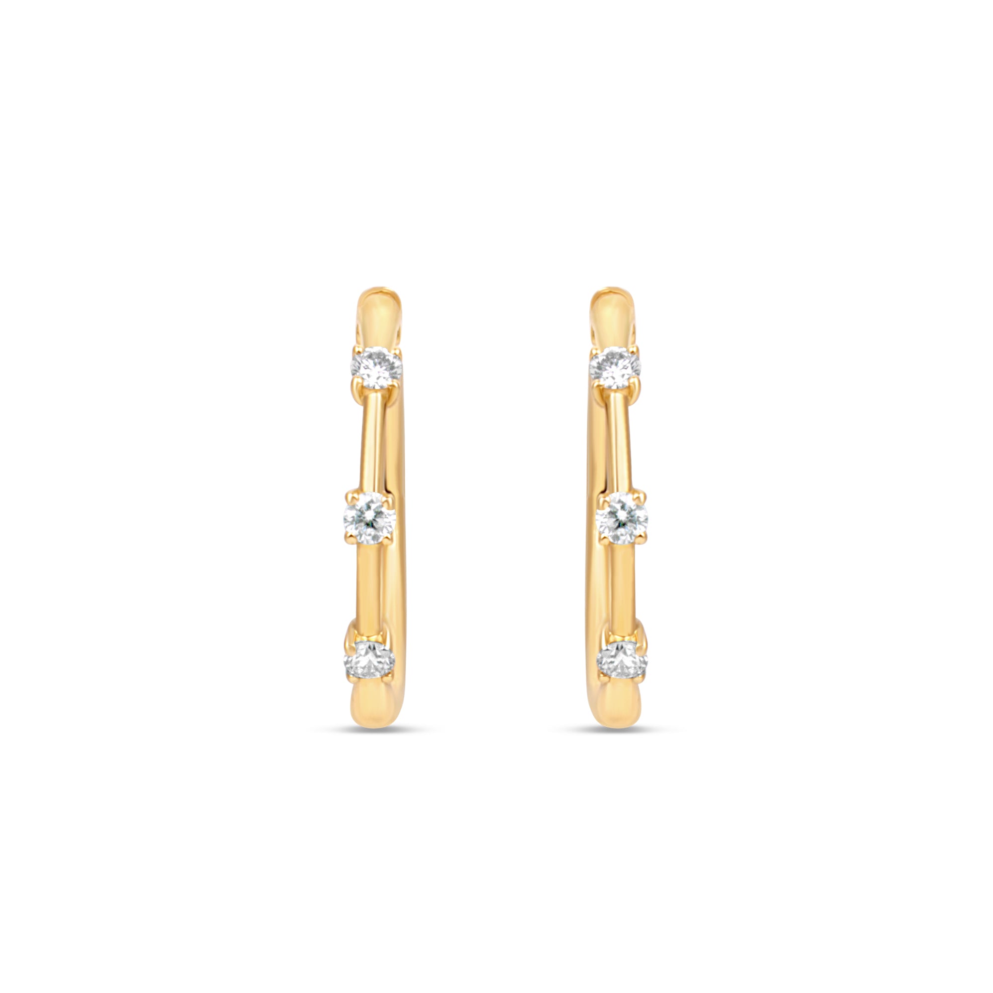 Medium Diamond Prong Set Huggie Hoop Earrings in 14K Yellow Gold by Elyzian – front view