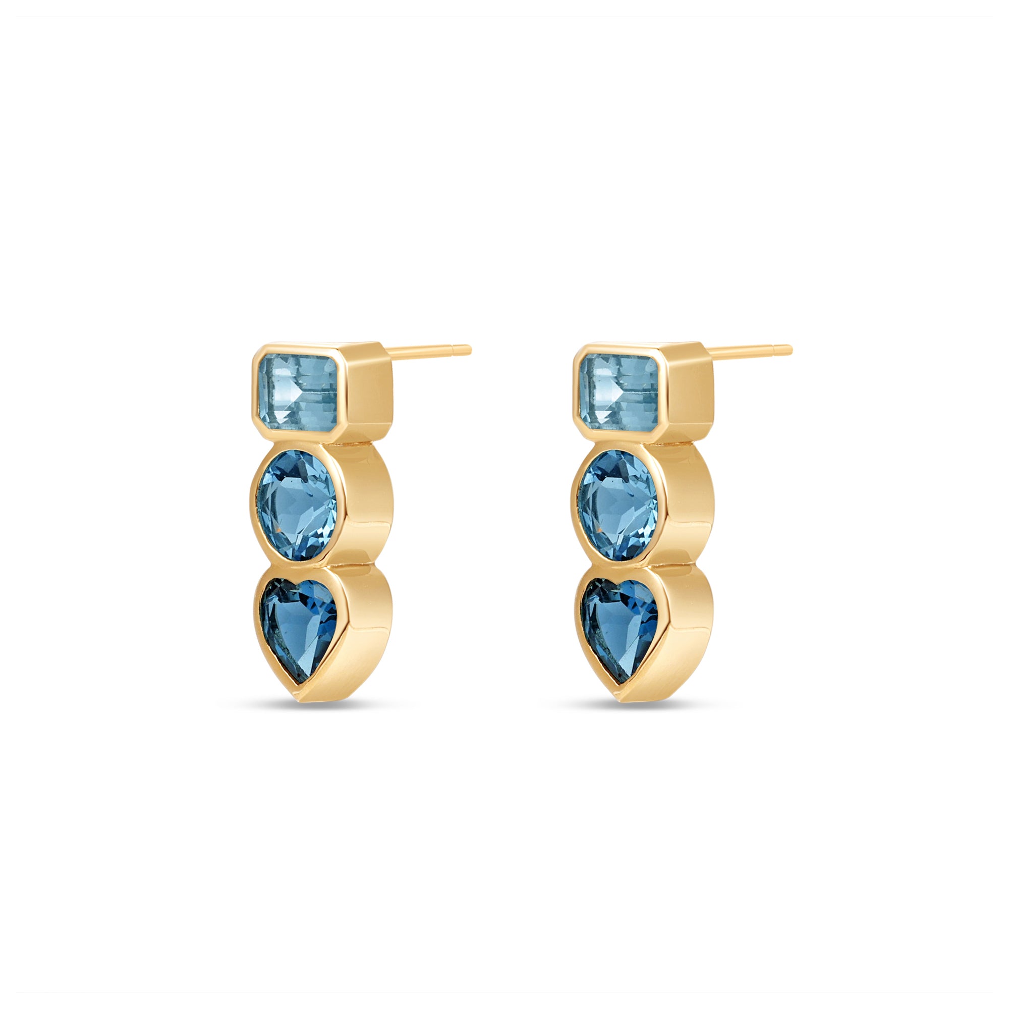 Angled view of a Pair of 14k yellow gold stud earrings featuring bezel-set London Blue, Swiss Blue, and Aquamarine gemstones in geometric shapes.