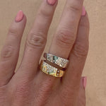 Dual-tone cigar band on a white background; both yellow and white gold have scattered natural diamonds.