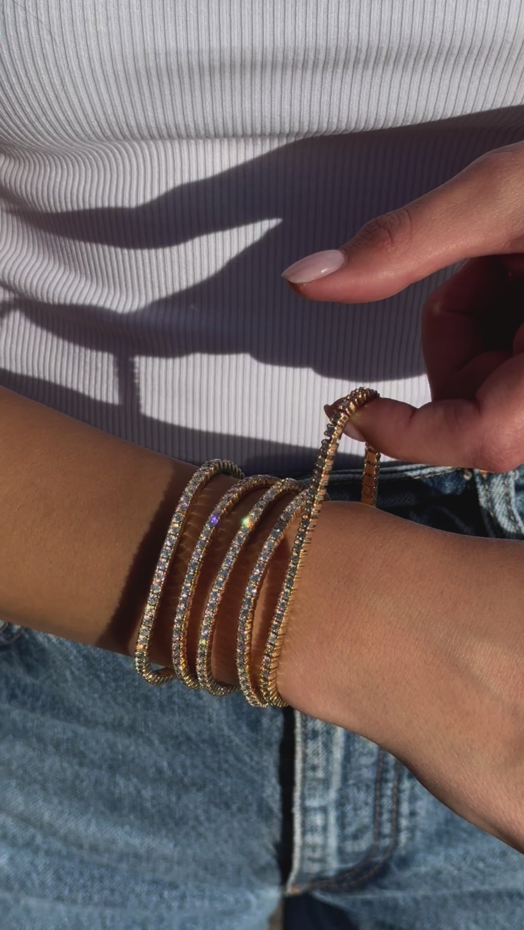 Luxurious stretch diamond tennis bracelet featuring G-H color, VS clarity diamonds in flexible settings. Available in multiple sizes, from 2.75ct to 9ct, for a perfect, comfortable fit with timeless brilliance. On model 