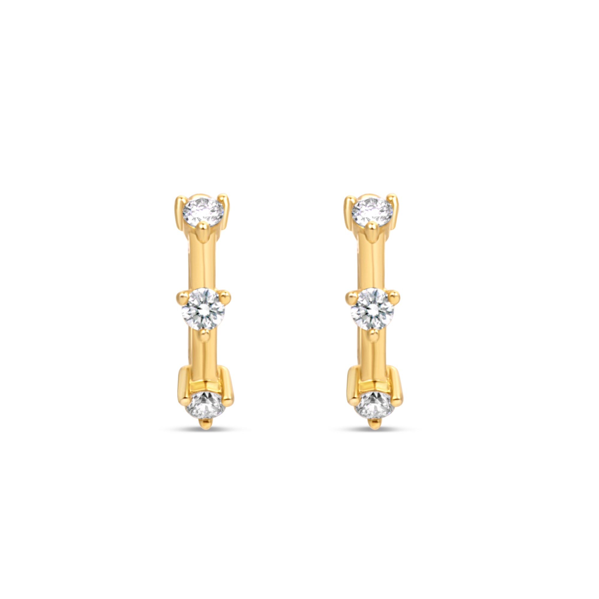 Small Diamond Prong Set Huggie Hoop Earrings in 14K Yellow Gold by Elyzian – front view