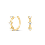 Side view of Small Diamond Prong Set Huggie Hoop Earrings in 14K Yellow Gold by Elyzian