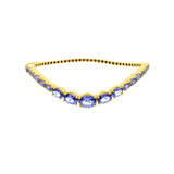 Tanzanite Wave Bangle in 14K Yellow Gold by Elyzian